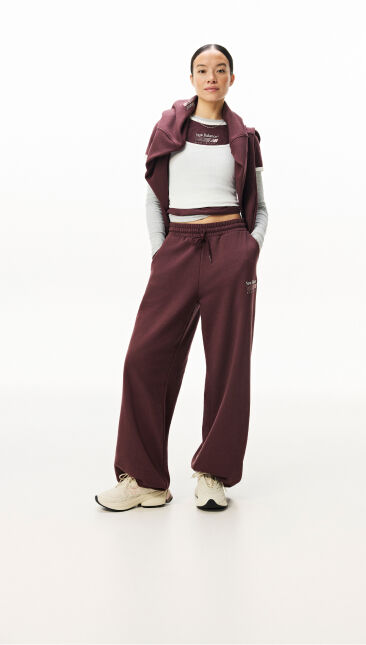 Woman standing with her hands in her pockets